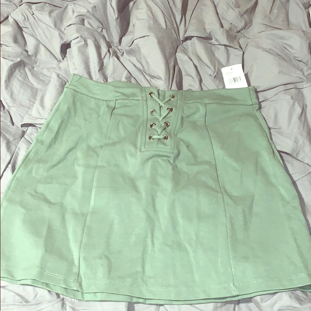 Gorgeous olive green lace up mini skirt